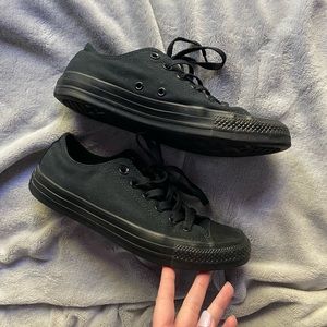 All black low top Converse